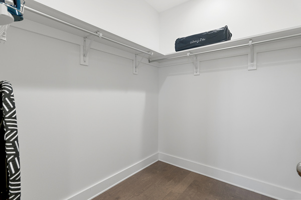 Master closet,pack n play, ironing board and iron