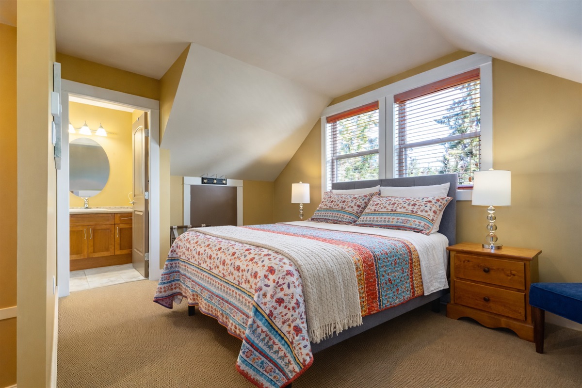 Semi-private loft with comfy queen bed & private ensuite