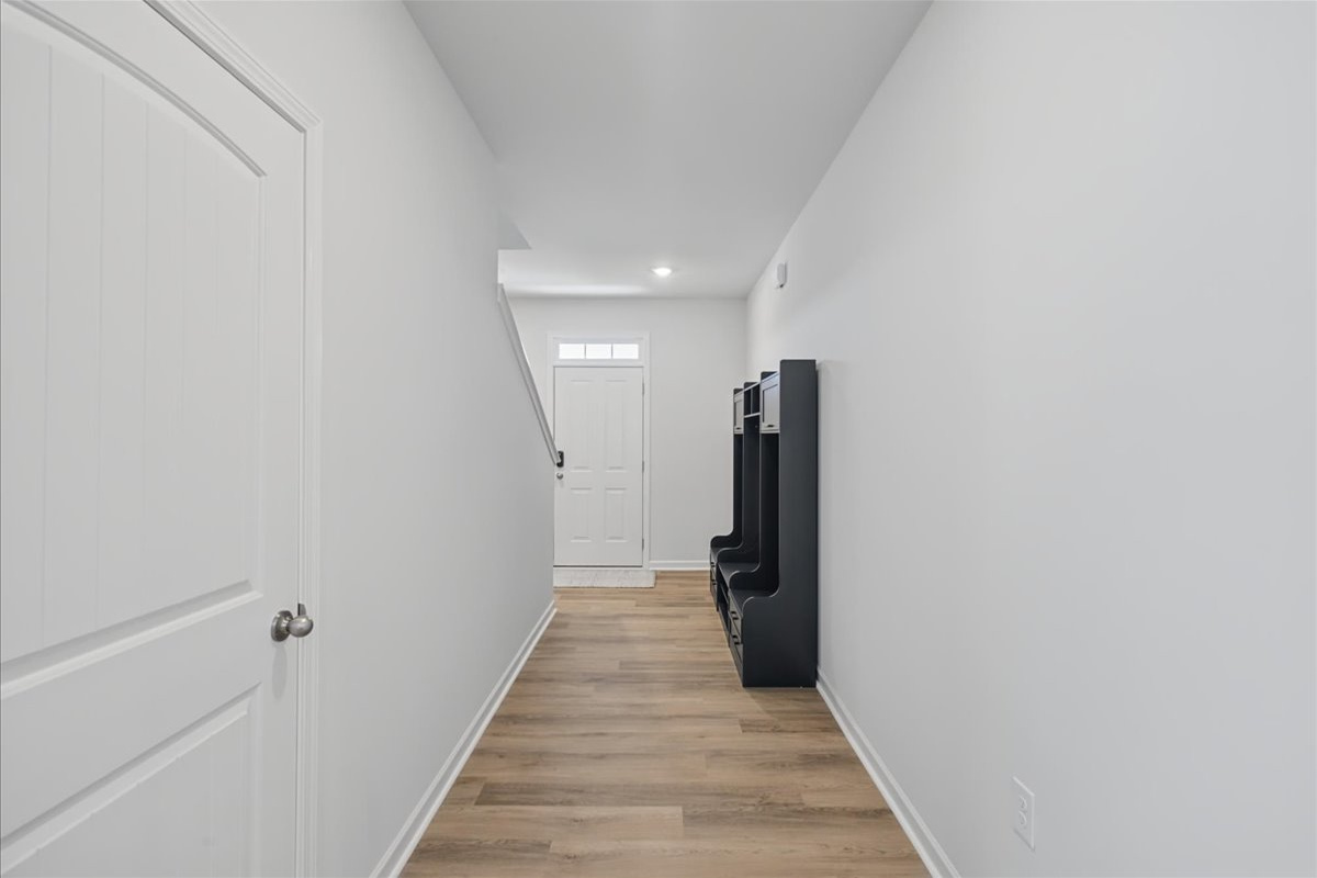 Bright front hallway leading to the main level