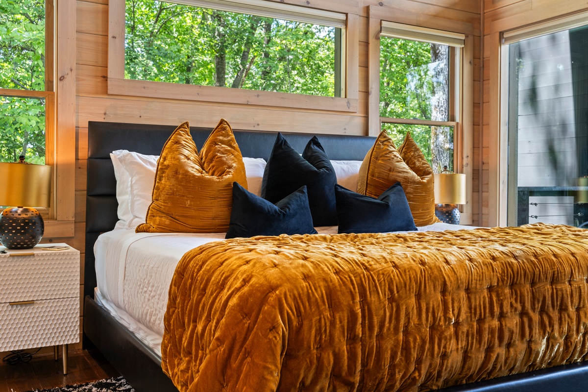 Oversized windows that fill the space with natural light and breathtaking views of the outdoors.