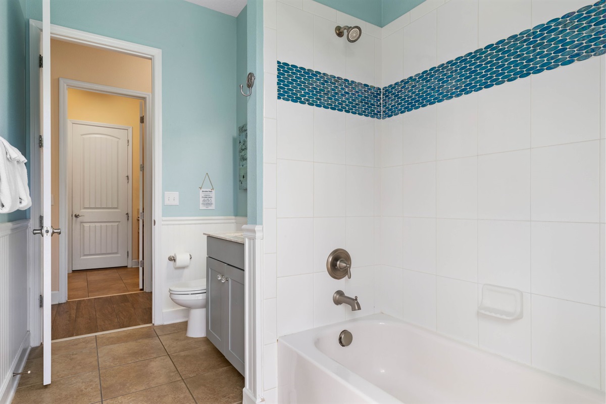 Rinse off the salt and sand, start the bath for sleepy little ones, and reset for another beach day—this bright coastal bath keeps cleanup easy and the end of each adventure feeling calm, fresh, and effortless.