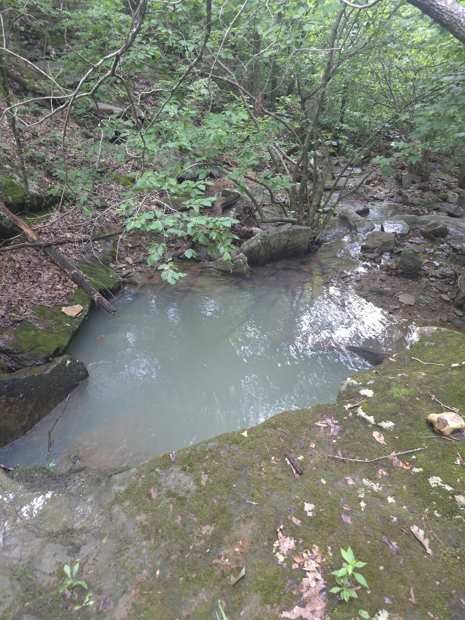 Waterfall next to cabin