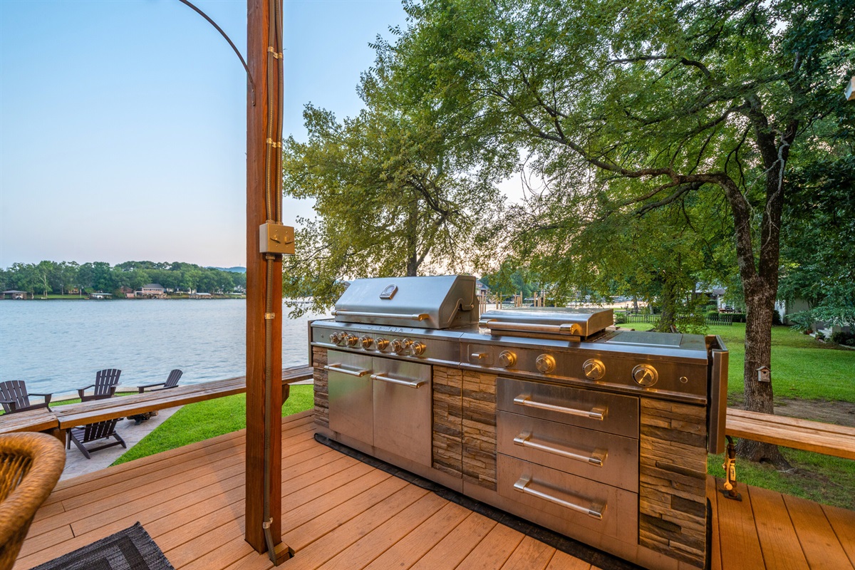 Fire up the grill and serve up lakeside feasts on this top-of-the-line outdoor kitchen setup.