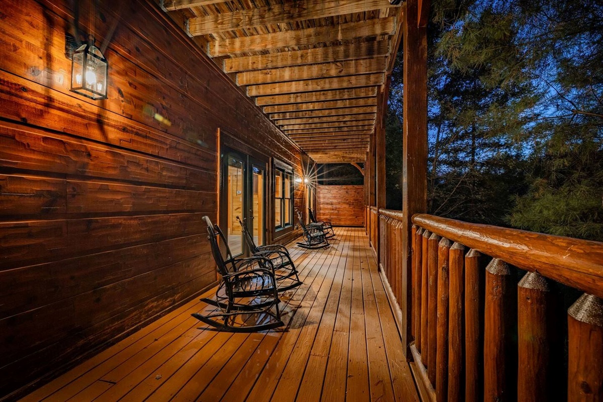 Multi-level covered decks with rocking chairs on every floor. Mountain views from every level of this 5-bedroom Gatlinburg cabin. Sleeps 12.
