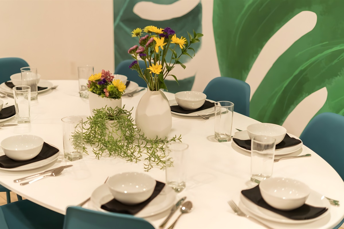 Share a gourmet meal at the large, modern dining table