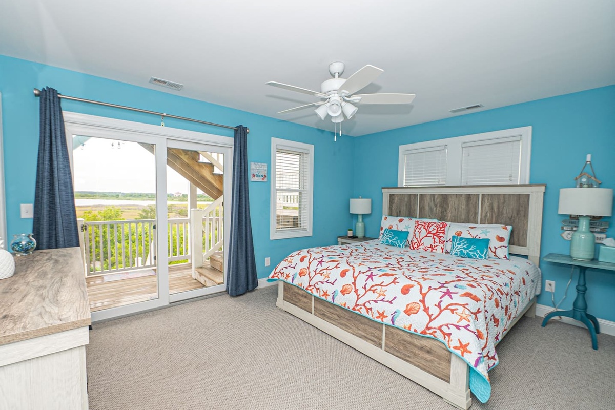 King Master bedroom, private baclony overlooking the intercoastal. Private bath. linens and towels provided as well as starter paper supplies, shampoo and soap. Iron board, extra pillows and blankets