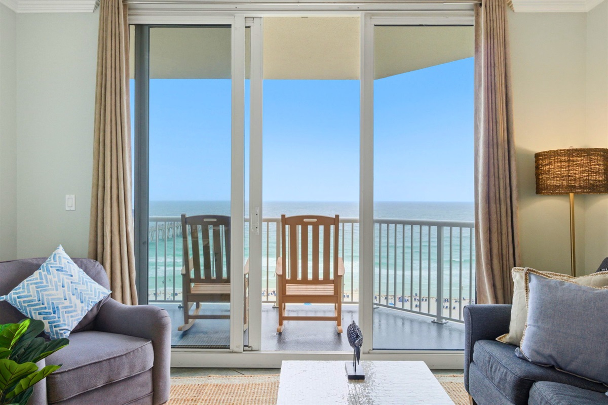 Just beyond the glass doors, your private balcony invites you outside to enjoy the fresh ocean air and incredible views.