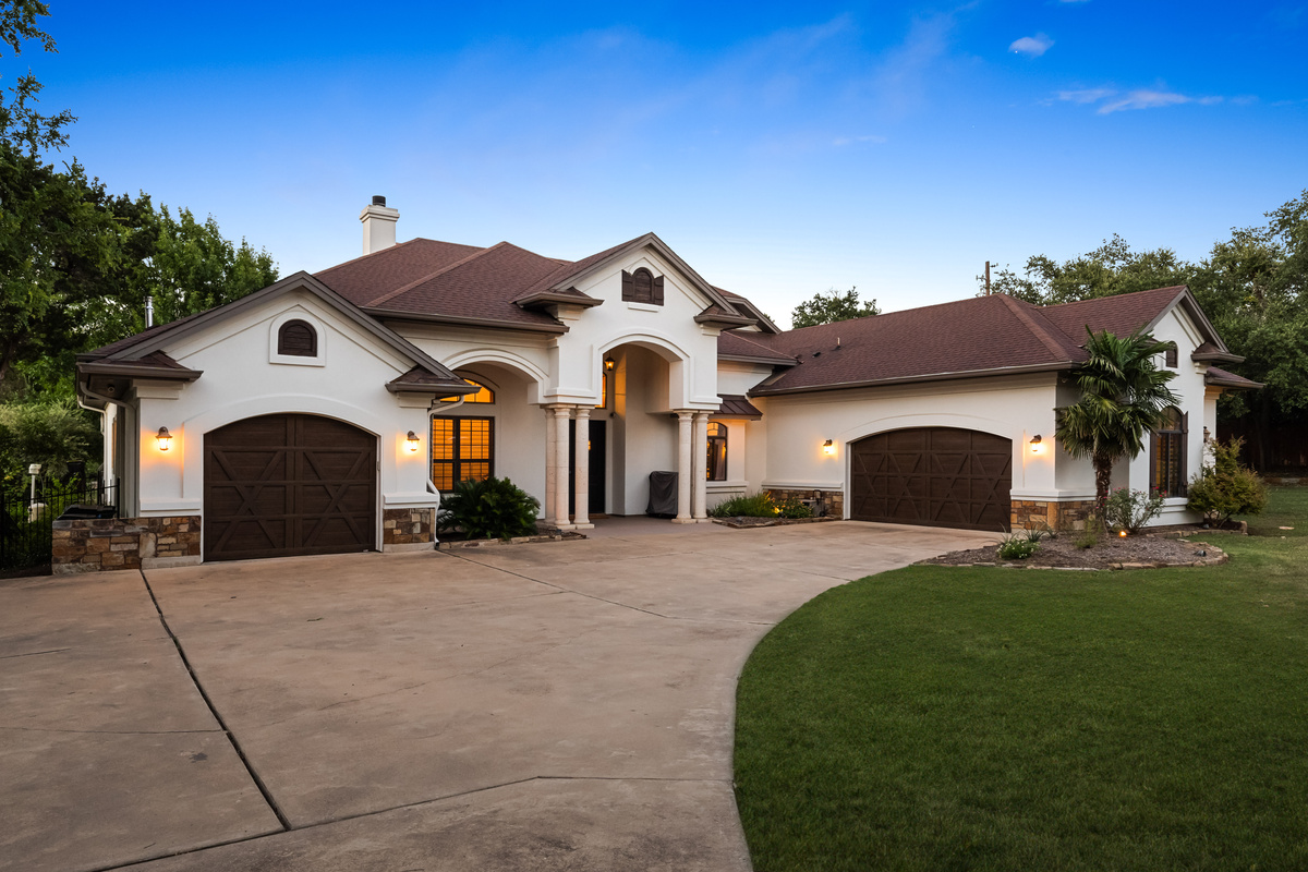 Spacious driveway with convenient parking for up to 6 cars.