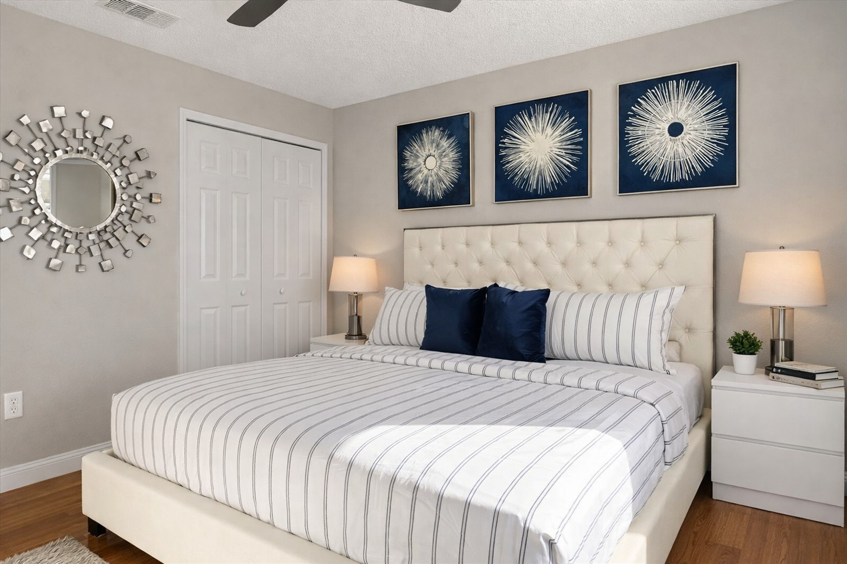 Modern KING bedroom with pillow top mattress and modern artwork. 