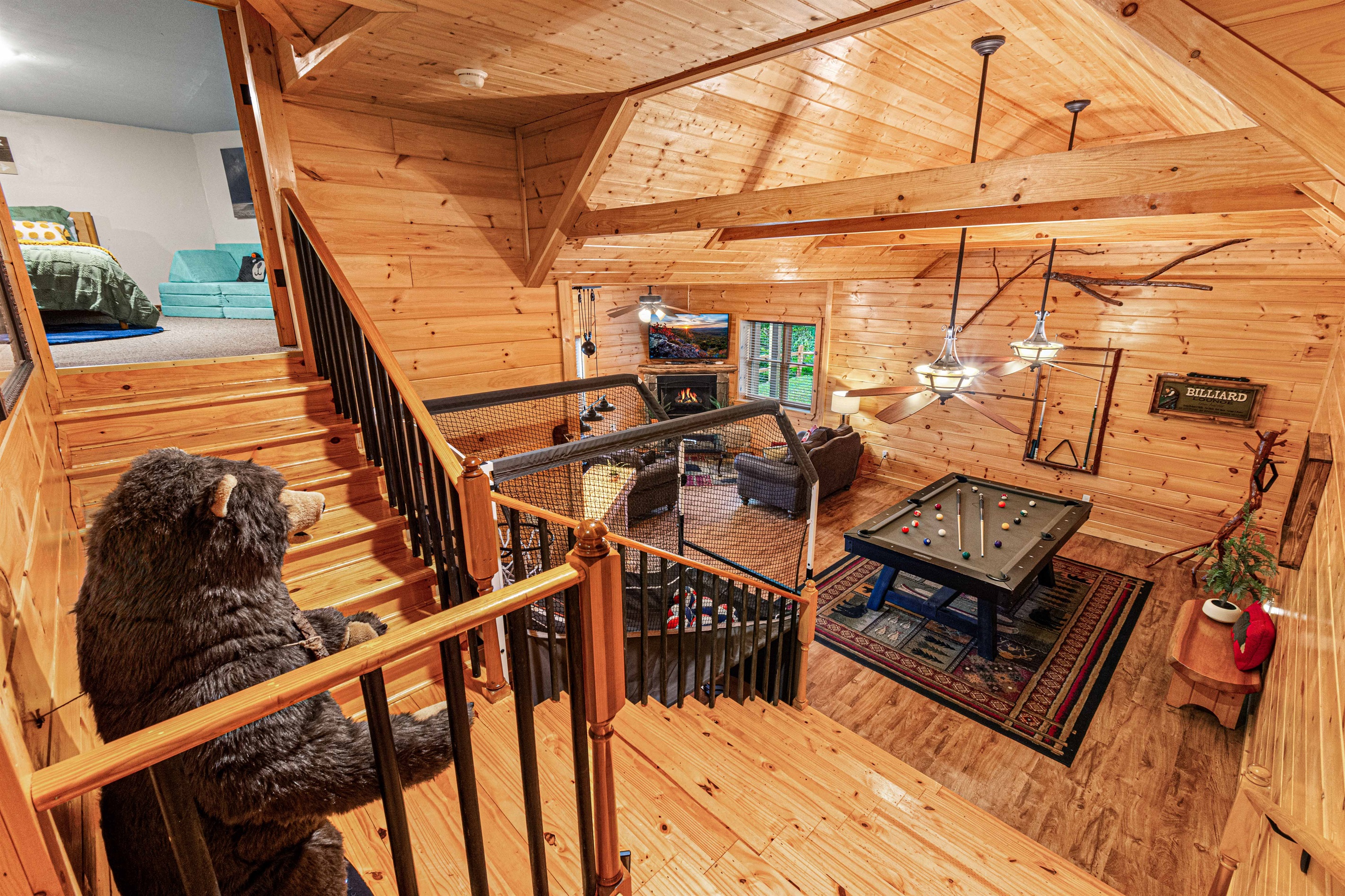 Rustic recreation. Enjoy the spaciousness and rustic charm of this amazing game room.