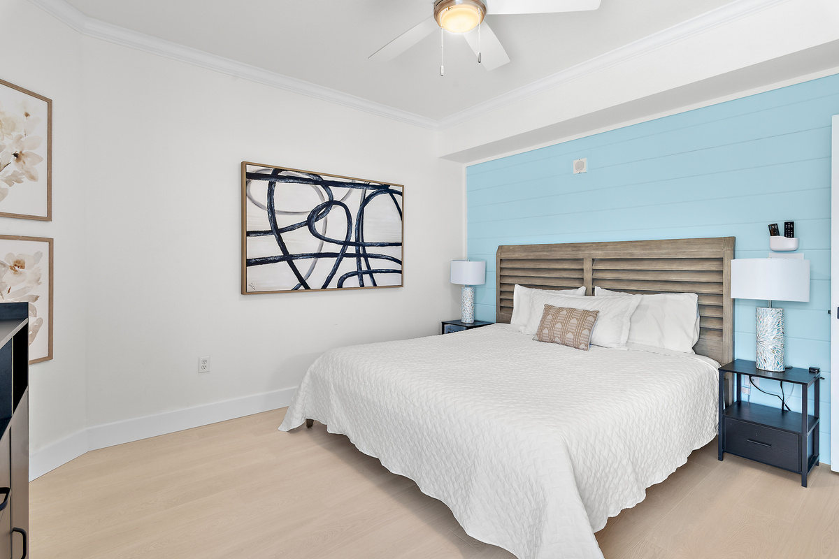 Guest Bedroom 1: King Bed, Smart TV, Gulf and Pool Views, Private Bathroom with Shower/Tub Combo (sleeps 2)