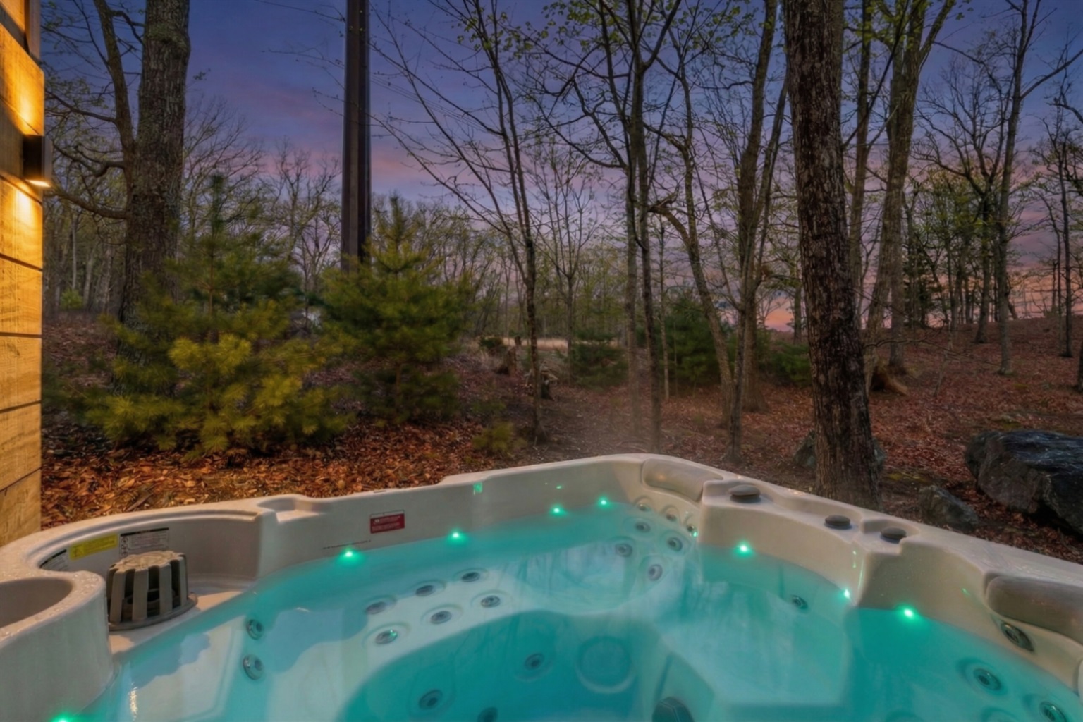 Sunset Soak: Enjoy the warm hot tub glow as the sun sets over the Pocono Mountains. Pure private relaxation!