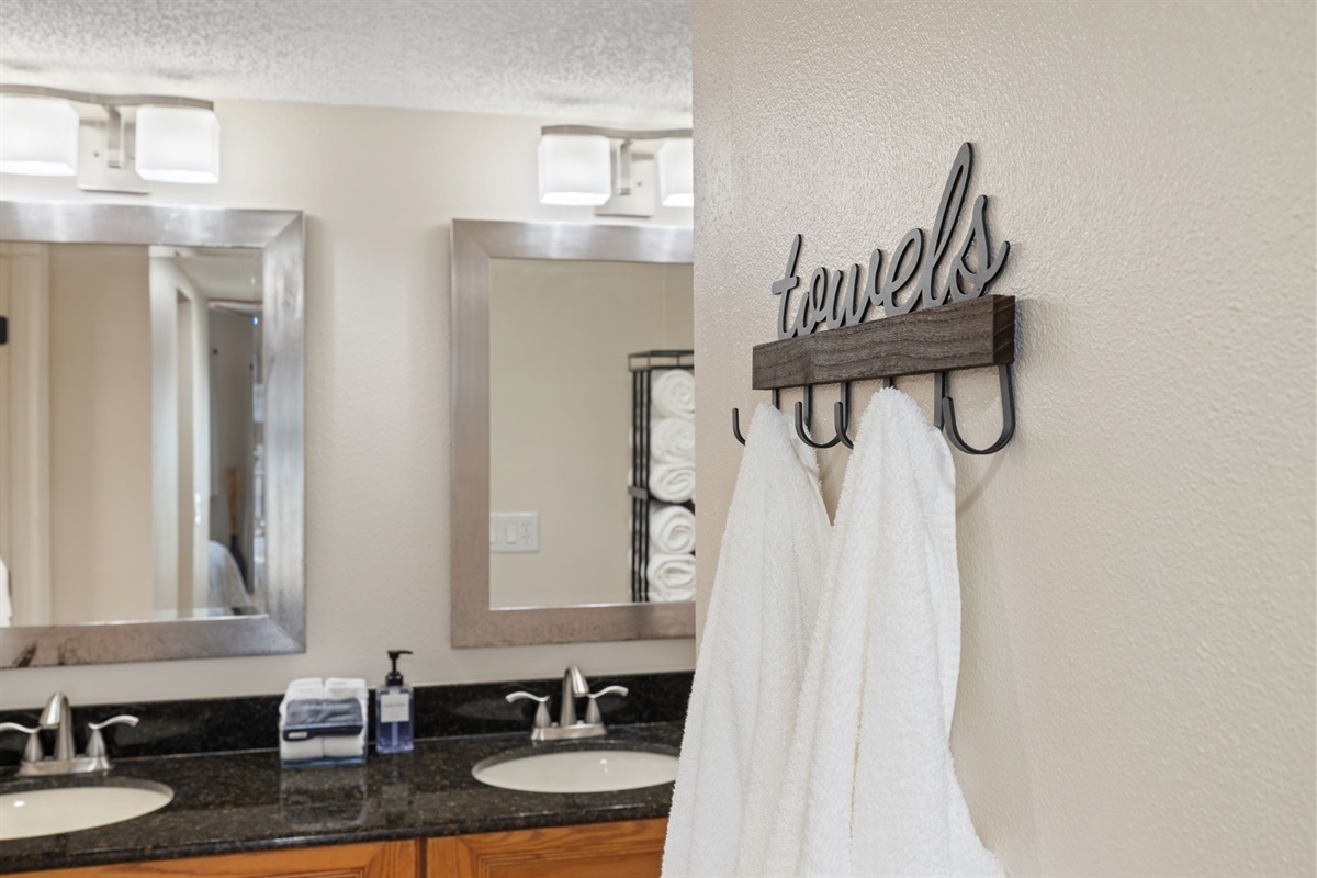King bedroom ensuite bathroom with double vanity.