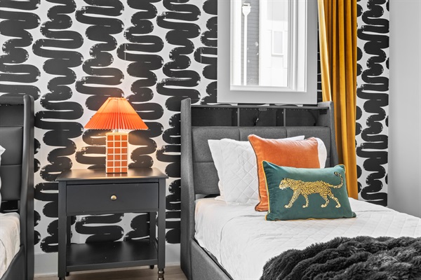 Bedroom Retreat: Bold patterns and vibrant decor create a stylish escape in Nashville!