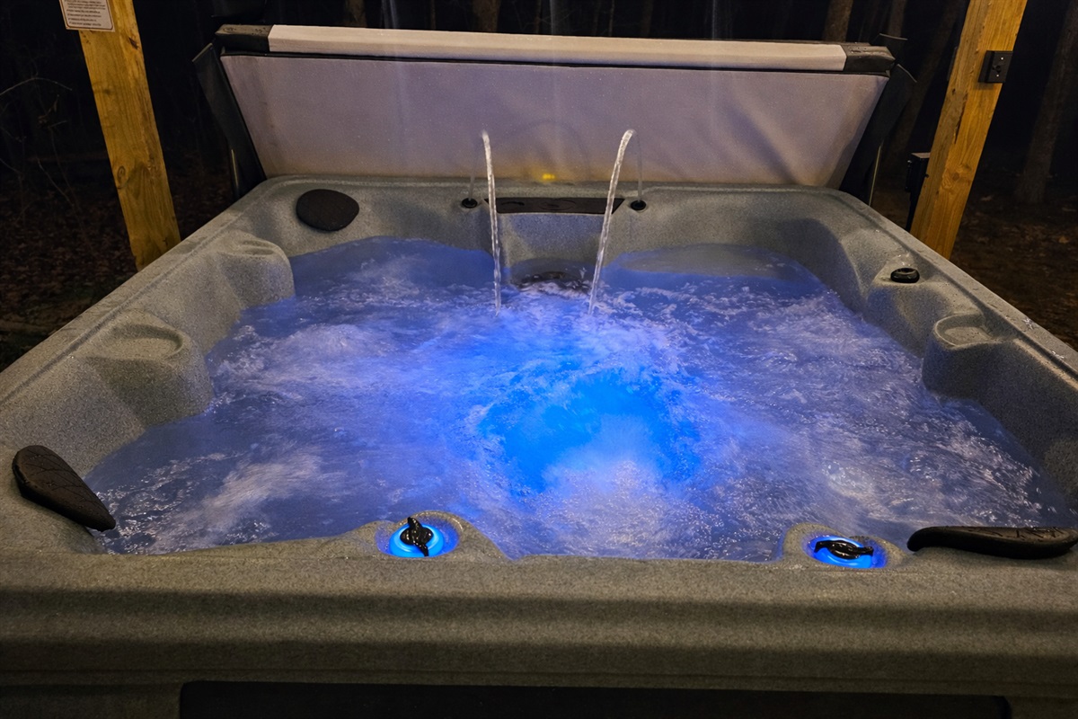 Let the warm, bubbling water and gentle waterfall features set the mood—this private hot tub offers a soothing, spa-like experience made for romantic evenings and peaceful moments together at