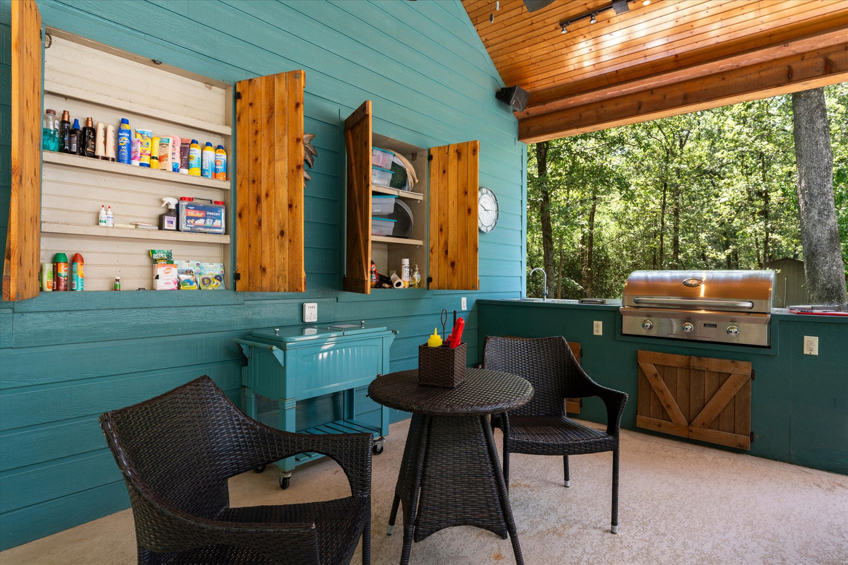 The outdoor kitchen, set poolside, features a massive BBQ grill and side burner, perfect for cooking while staying connected with friends and family. It is kept fully stocked with spices, cookware, cutlery, and more!