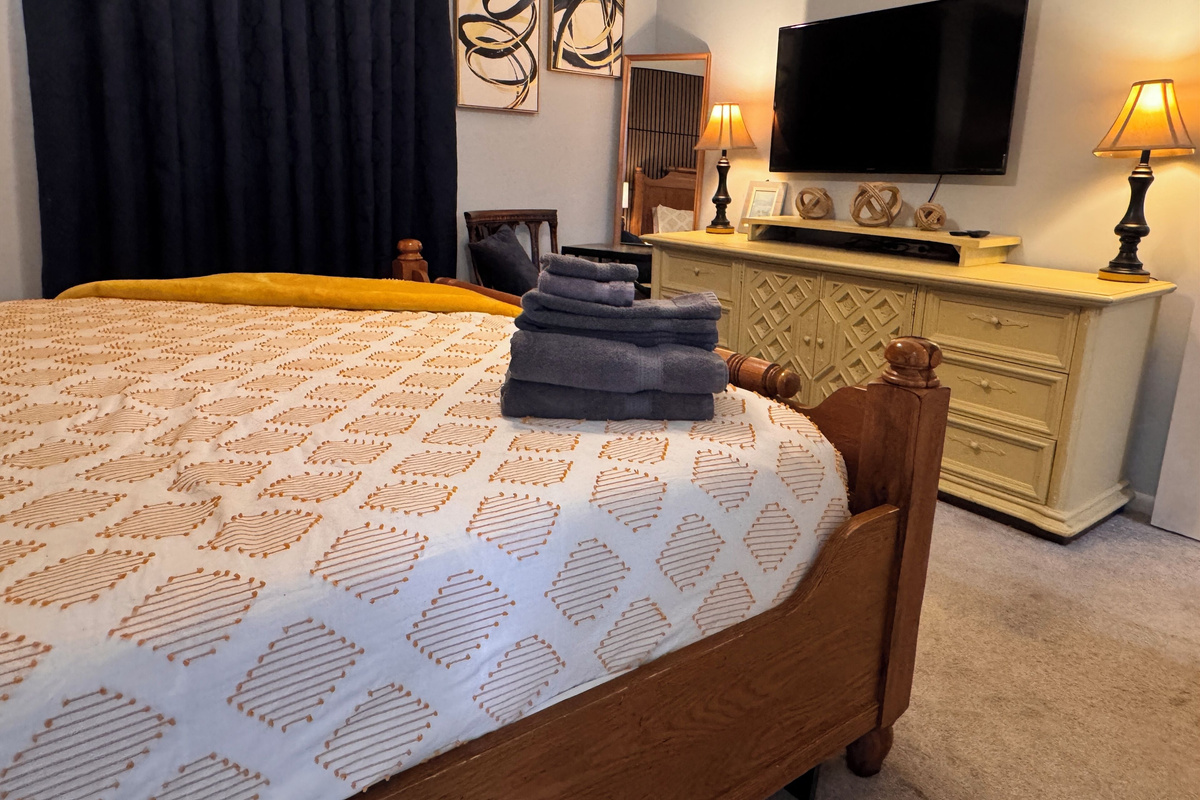Primary bedroom: king bed with fresh towels