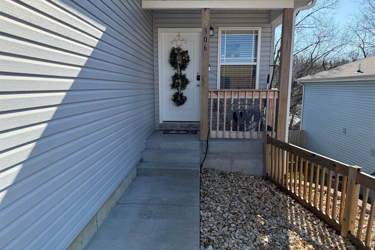 open path with lights to front door