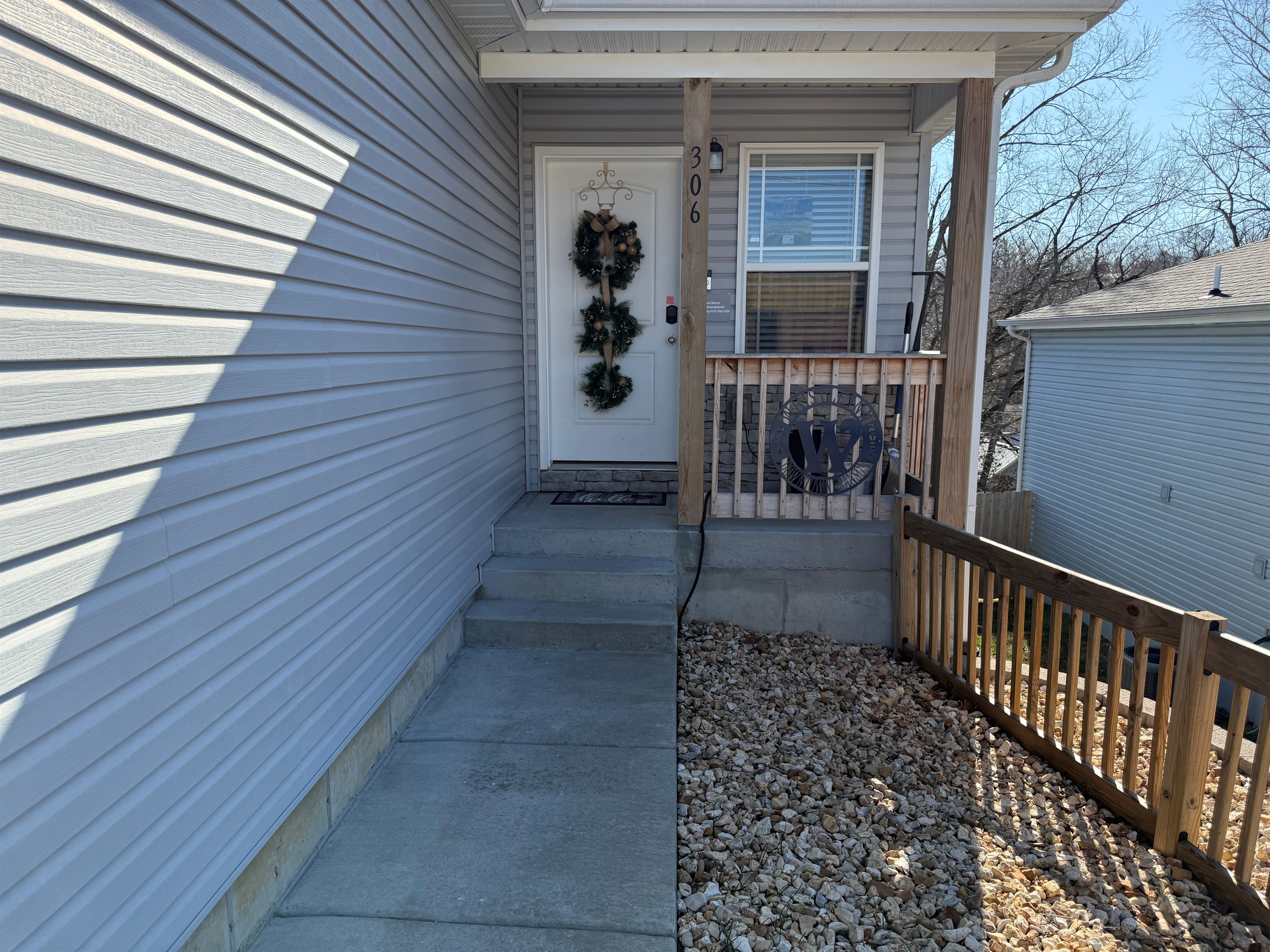 open path with lights to front door