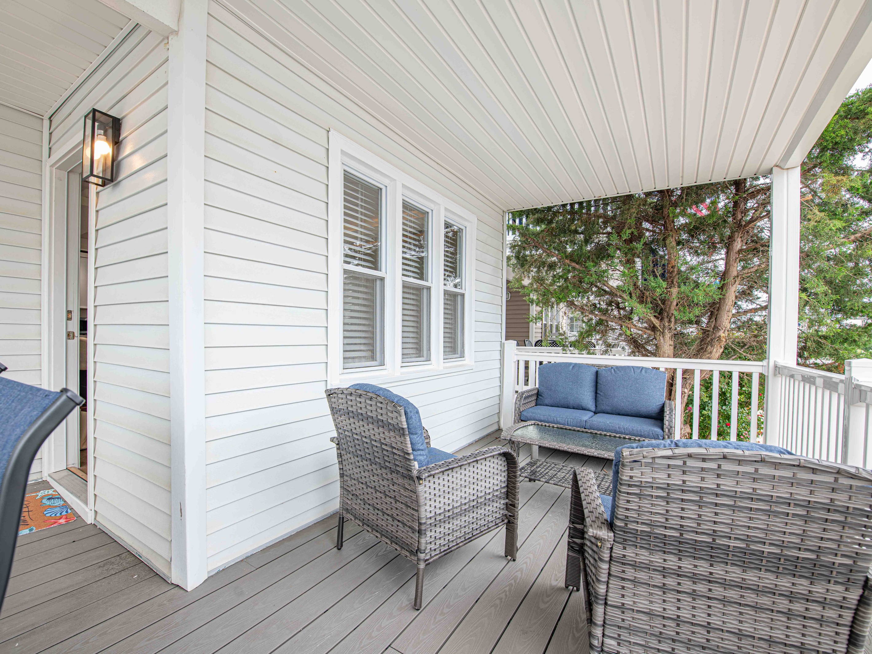 Covered Porch - Outdoor Wicker Lounge Area