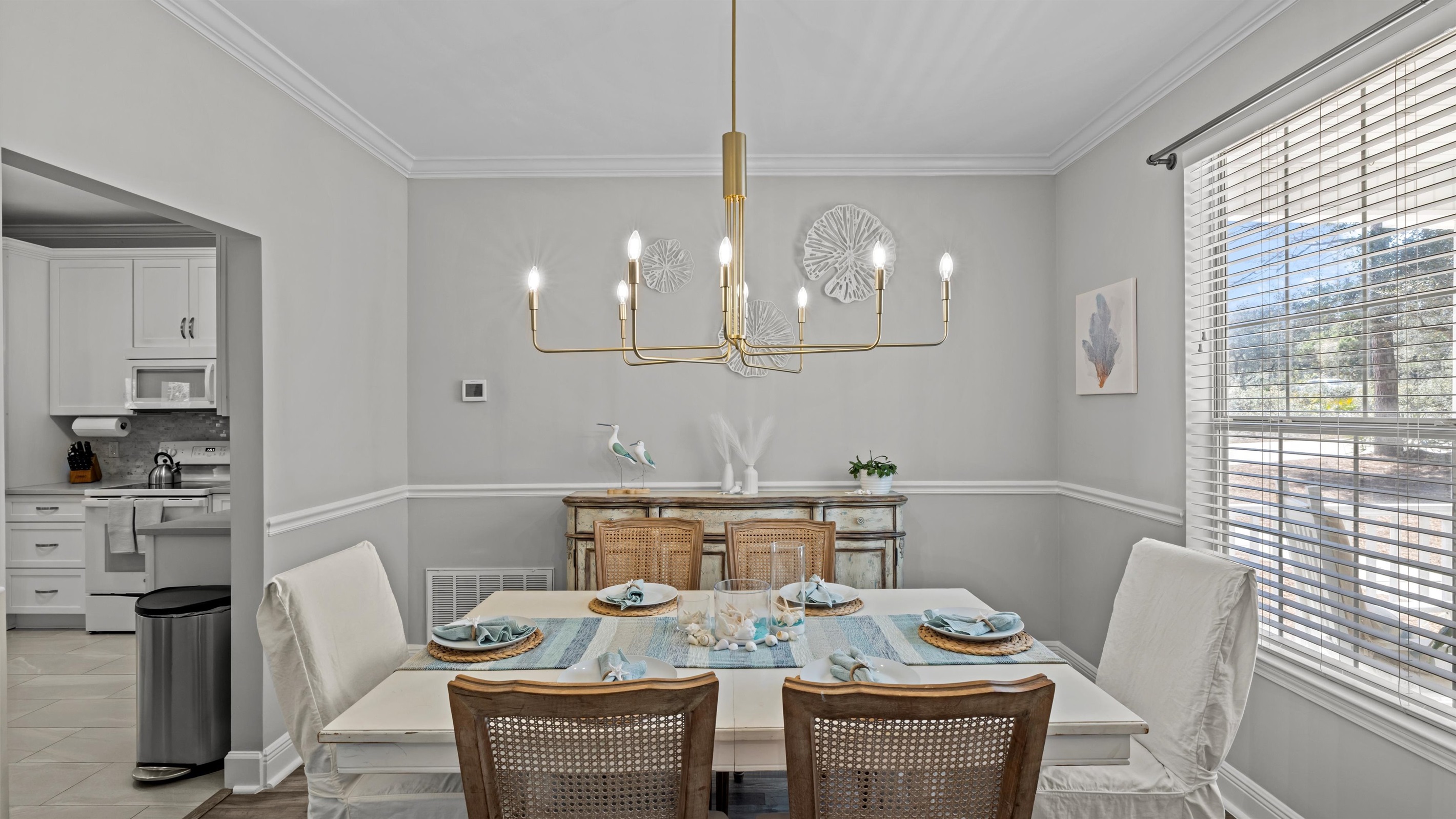 Coastal dinners, card games, or morning mimosas — the heart of the cottage is ready for memories.