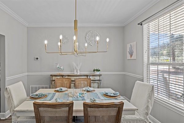 Coastal dinners, card games, or morning mimosas — the heart of the cottage is ready for memories.