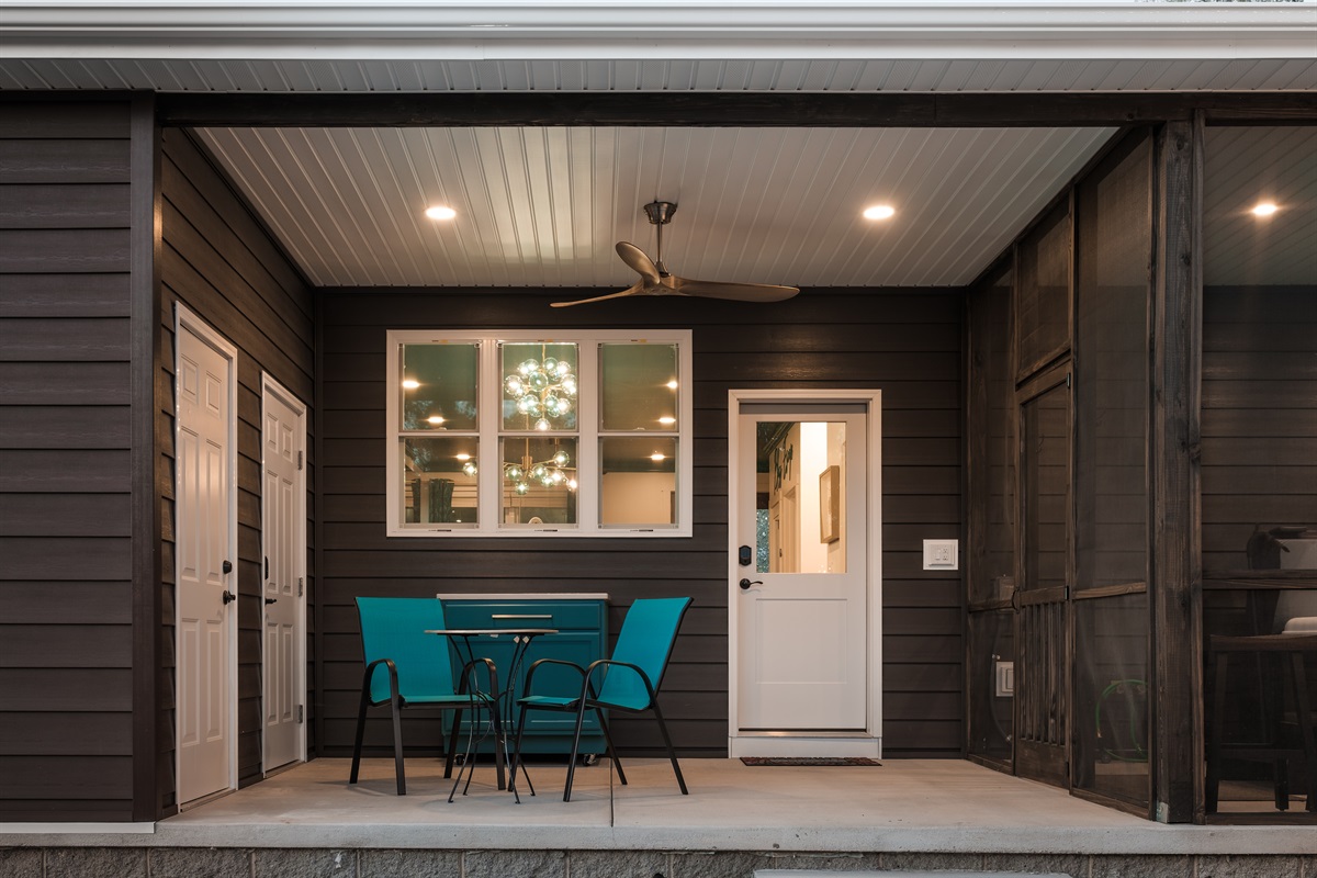 The patio’s thoughtful layout offers both open-air seating and shaded retreats for any mood.