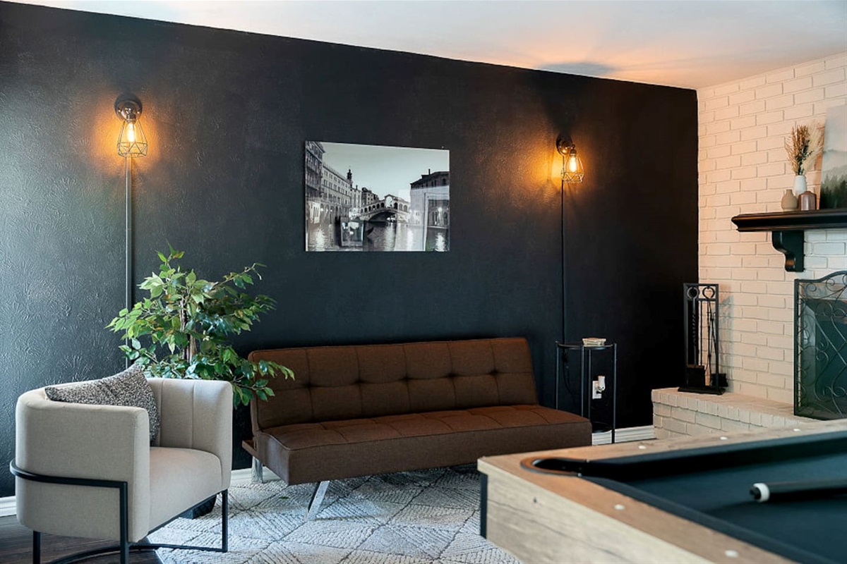 Enjoy the modern living room area and indoor fireplace for your ultimate comfort and relaxation