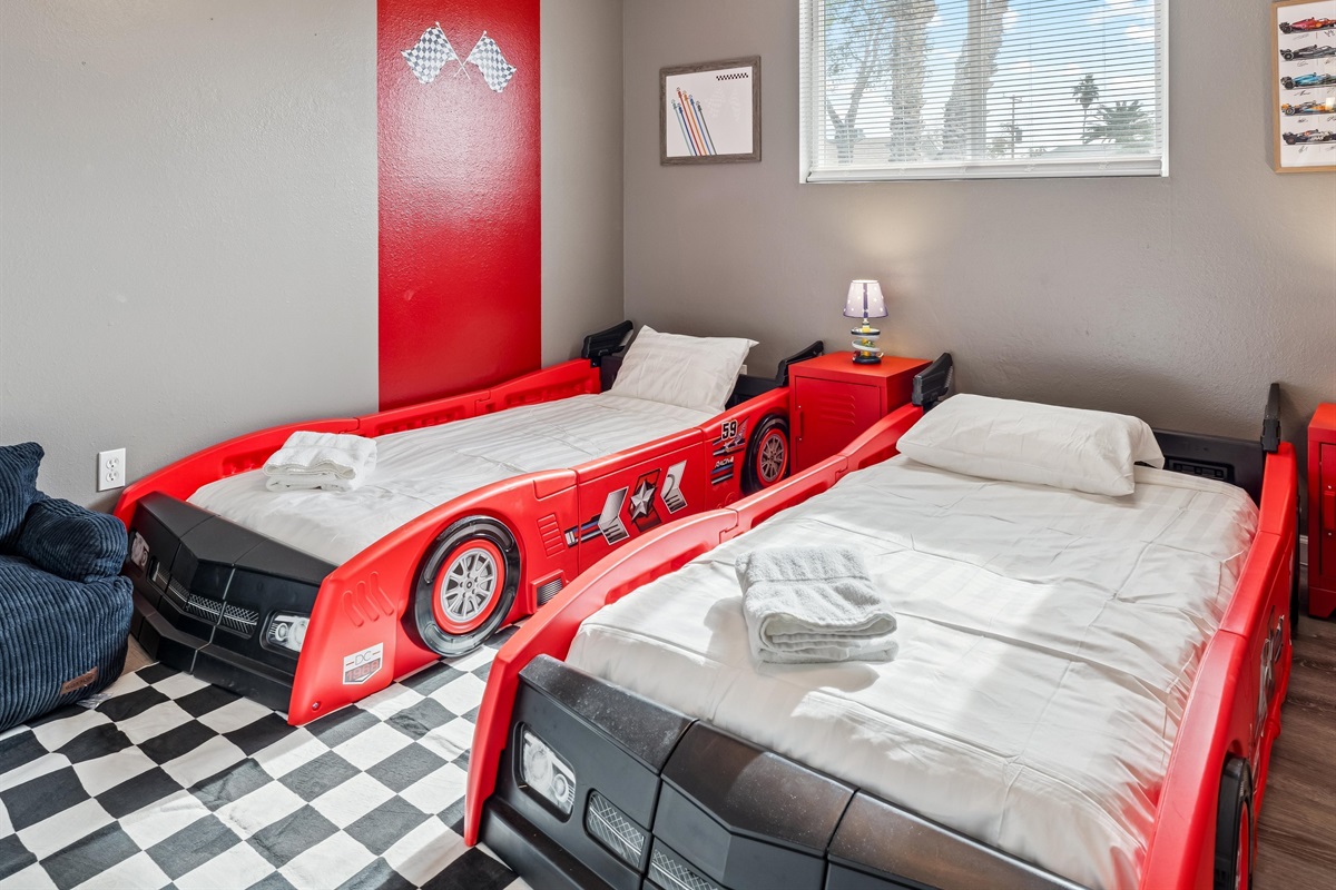 These racecar themed twin beds are perfect for the kids