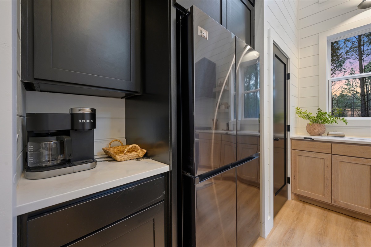 Thoughtfully designed open shelving and clean lines create a bright, airy, and inviting space.