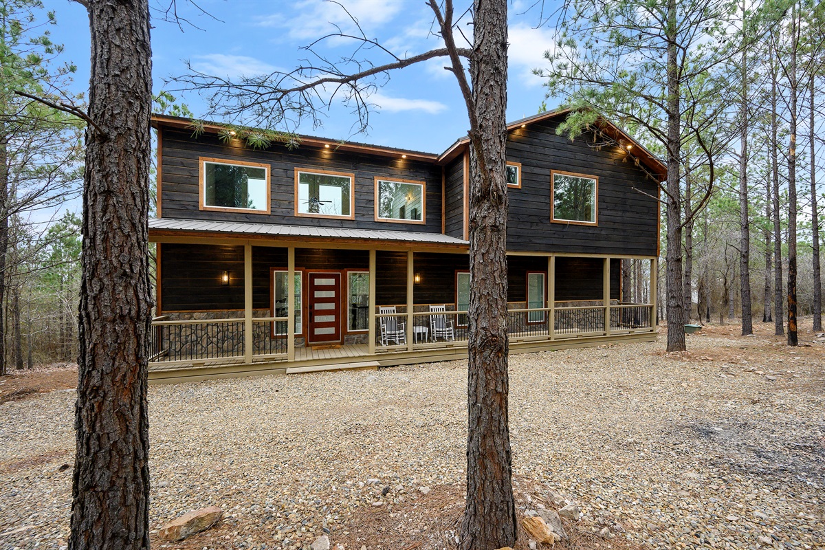 A clean, inviting cabin entrance featuring the front door — a simple and welcoming first impression of your private getaway.