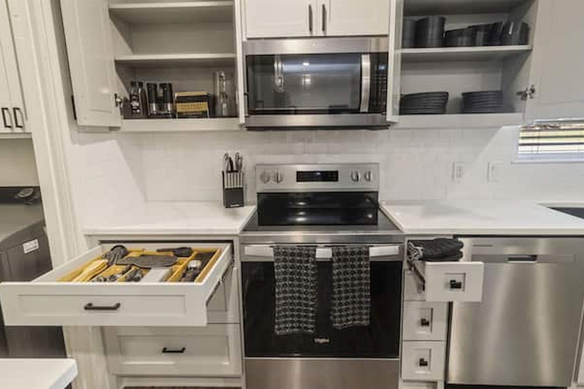 Stocked kitchen with cookware, utensils, and everything needed for easy meals during your stay.