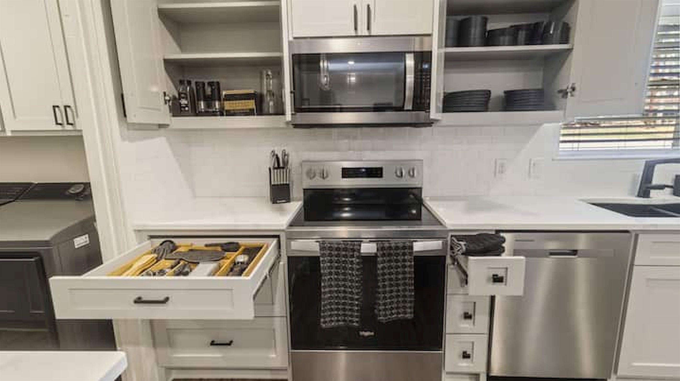 Stocked kitchen with cookware, utensils, and everything needed for easy meals during your stay.