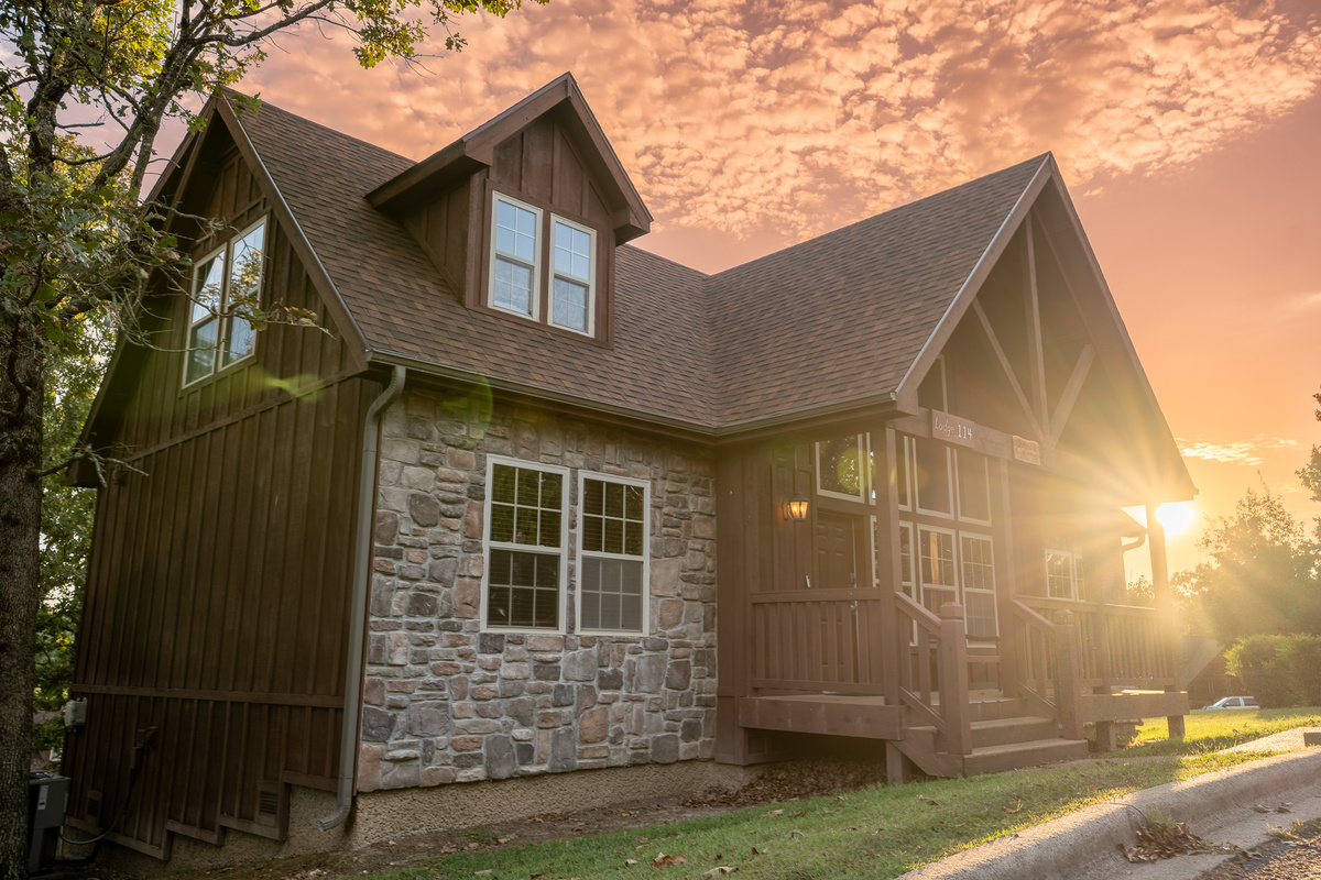 Your private Ozark lodge awaits! Tucked inside the gated StoneBridge Resort, this spacious cabin gives your group a peaceful place to come home to after exploring Branson.