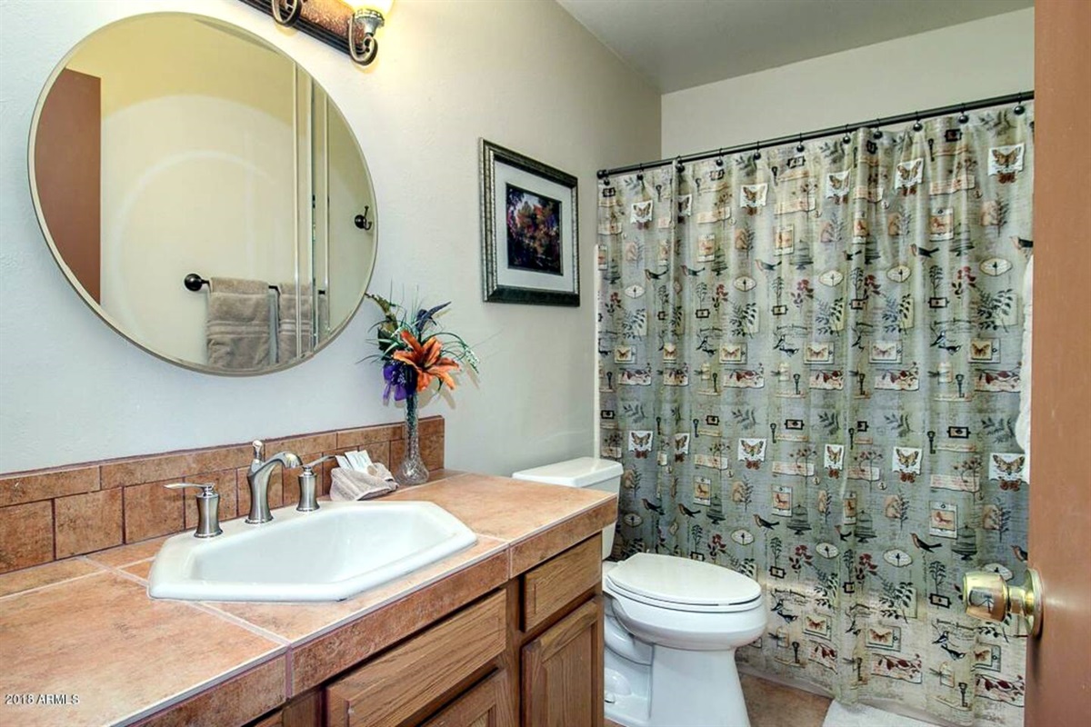 Full bathroom with tub/shower combo