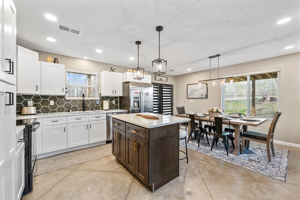 You’ll find cooking utensils, pots and pans, and plenty of dishes and silverware—everything you need to prepare and enjoy dinner together.