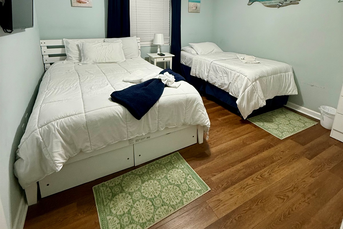 Bedroom 2 with a queen and twin bed