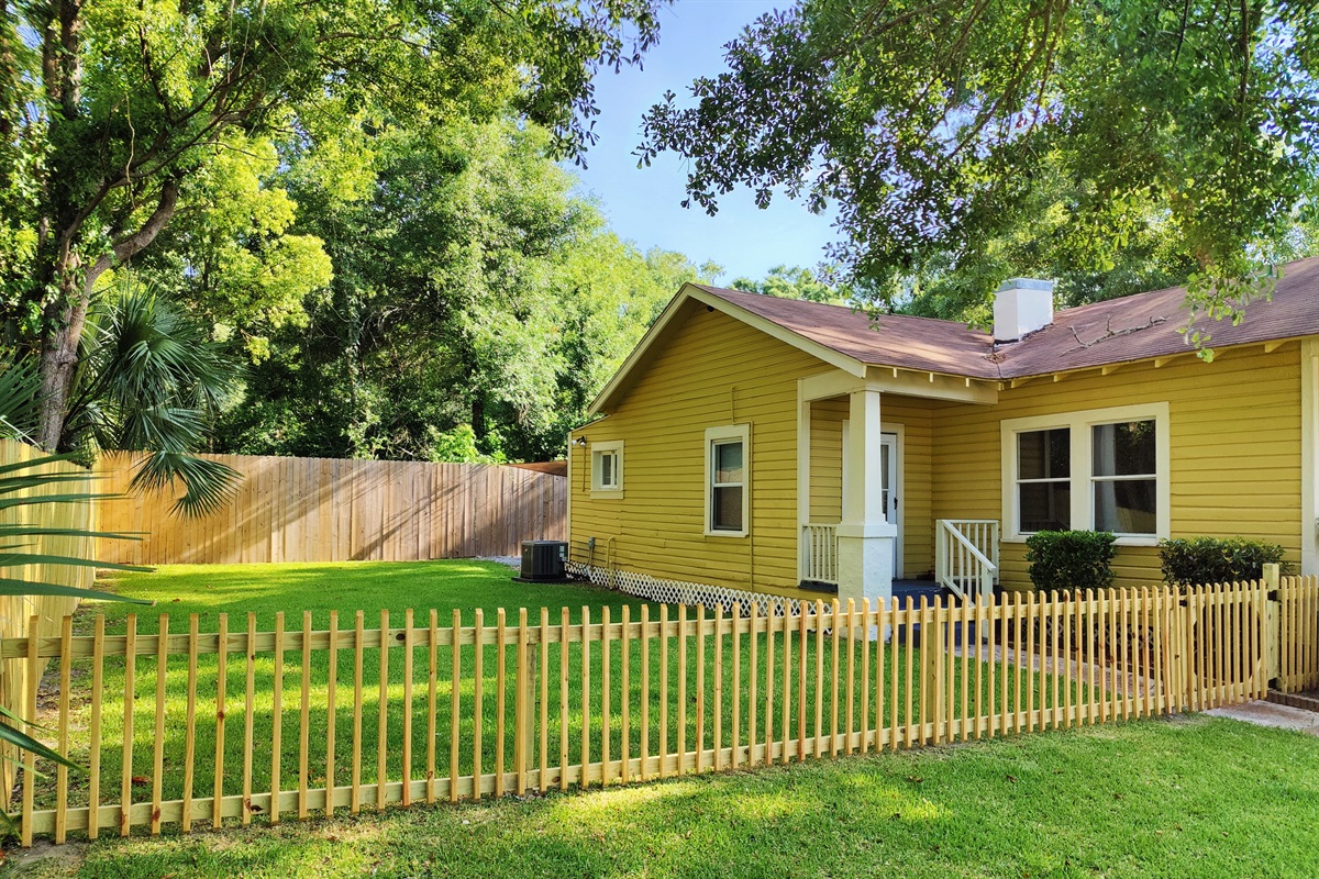 Green space and fenced in side & rear yard for dogs and children!