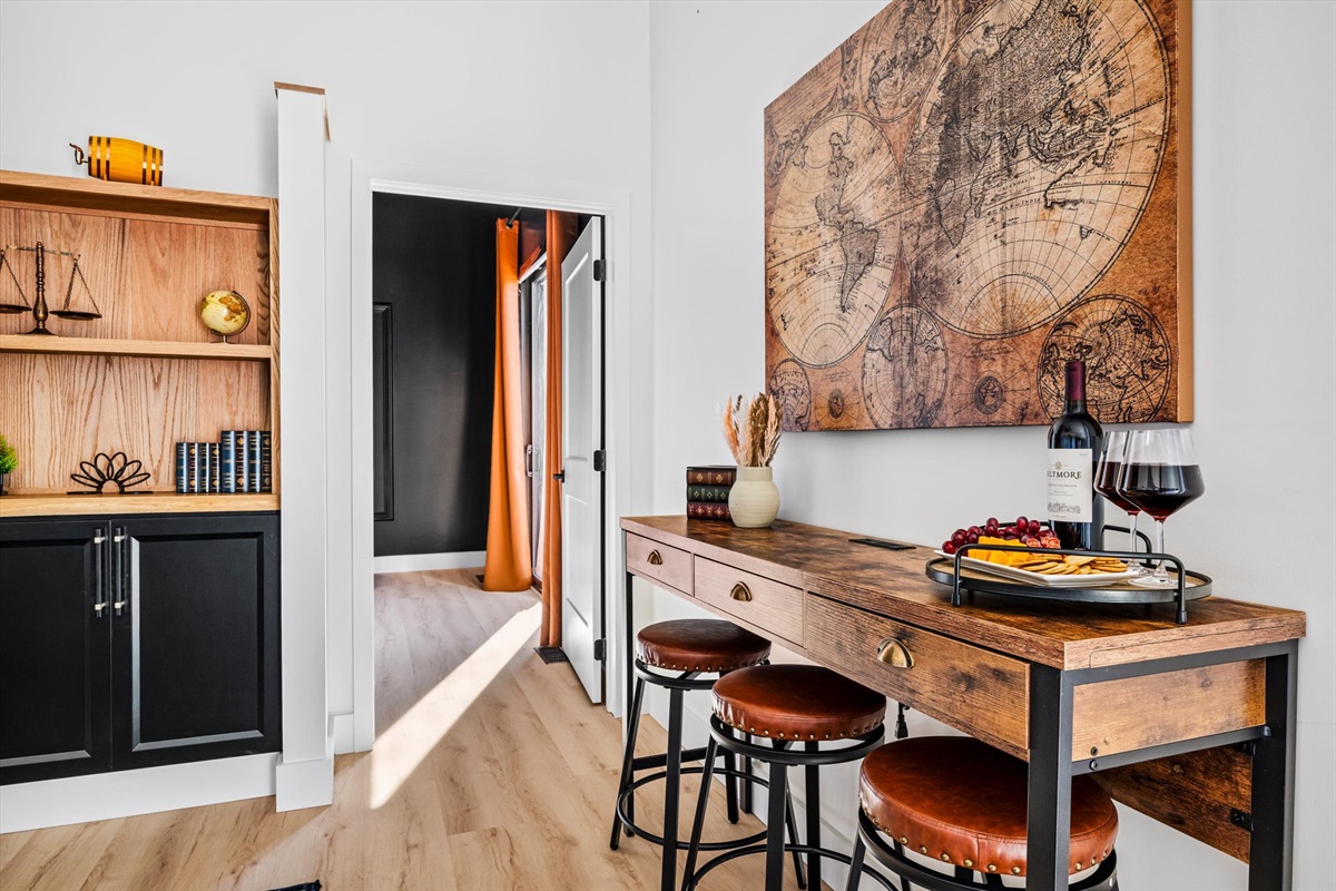 {Dining + Bar Area}
A dedicated bar and dining space designed for connection — ideal for pre-dinner drinks, shared meals, and evenings that naturally linger.