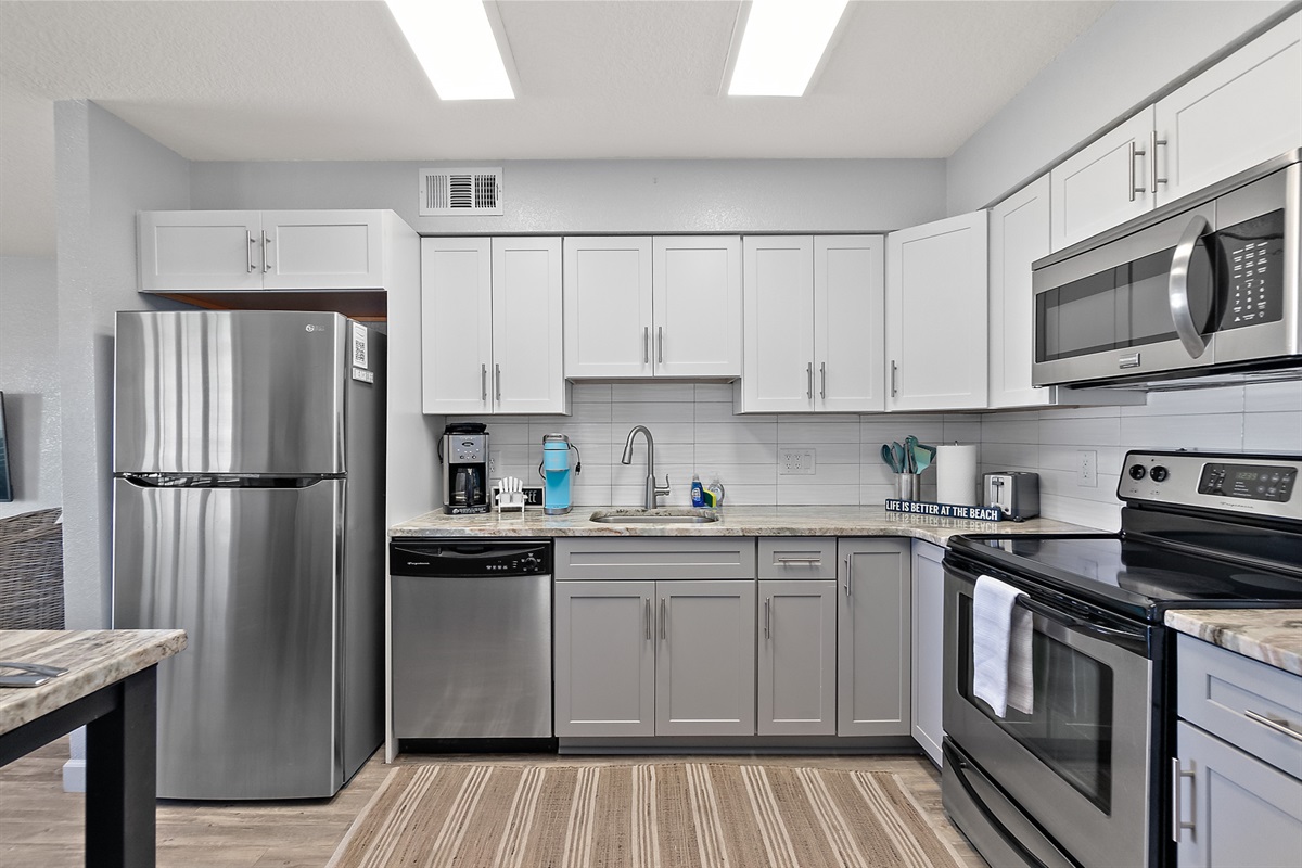 Fully equipped kitchen with coastal touches