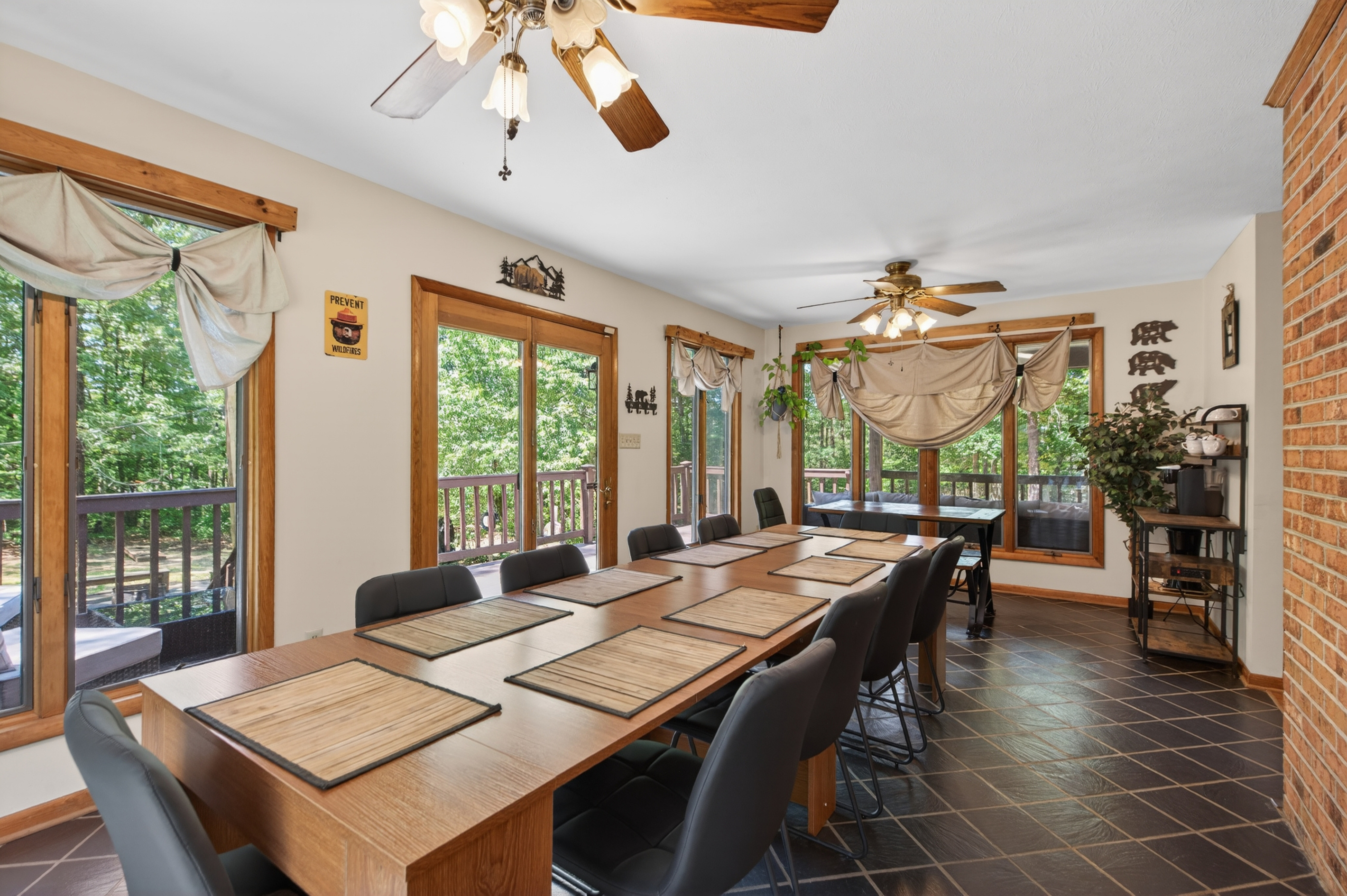 Dining Room: Gather around the spacious table and enjoy nature views while dining in style!