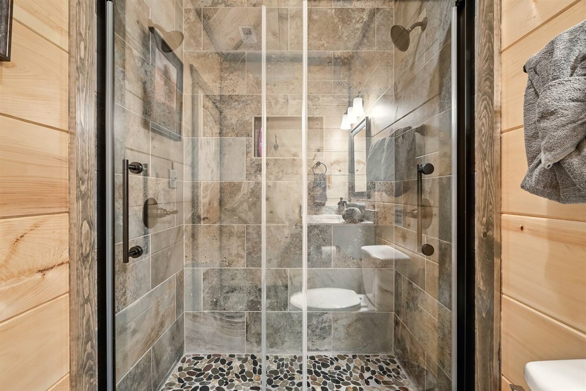 Main level: Dual head master walk in shower