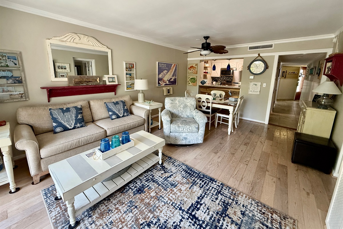 Living/Dining Area with Hardwood Flooring Throughout