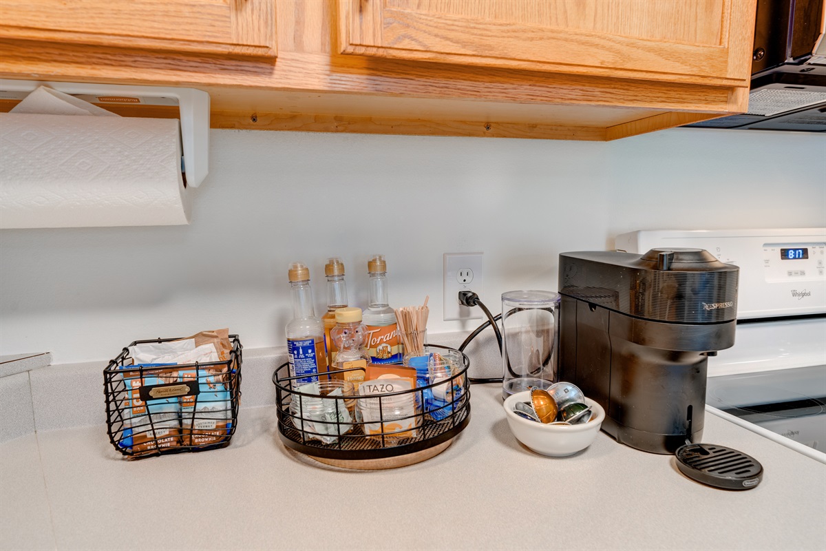 Complimentary Naspresso coffee and a variety of tea choices to enhance your stay - everything you need for a cozy morning.