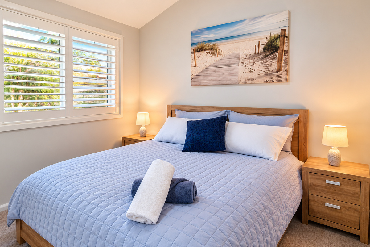 Rest and recharge in the comfortable queen bed, complete with crisp bedding, soft pillows and fresh towels ready for your arrival.
