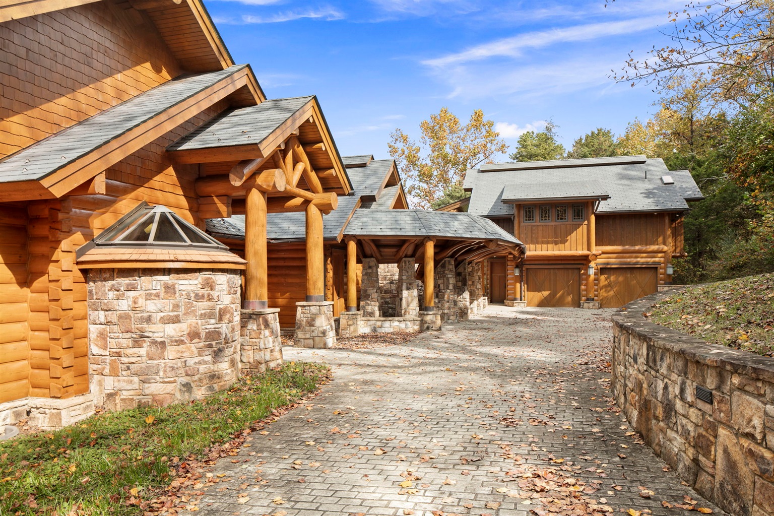 Sweeping driveways and covered walkways along the front