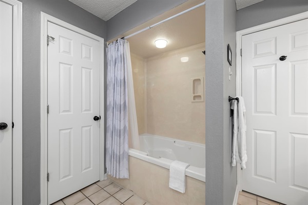 Bathroom Oasis: Relax in the soothing tub after a day of Branson adventures!