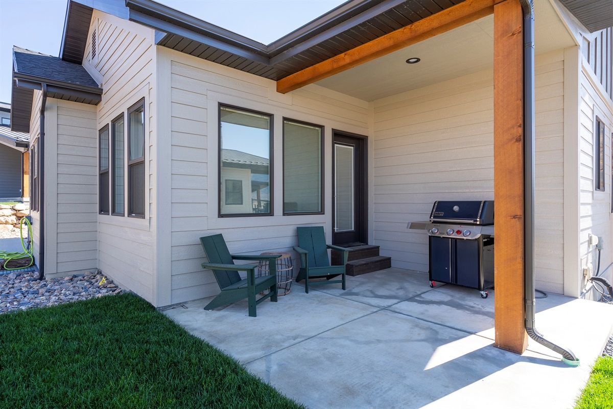 Private back patio with outdoor seating—perfect for relaxing and enjoying fresh mountain air.