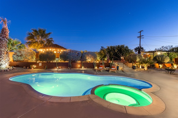 Pool and hot tub at night