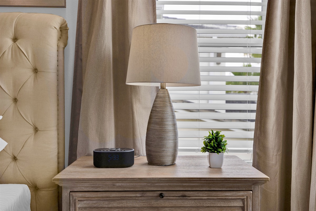 There is an alarm clock at each adult's bedrooms